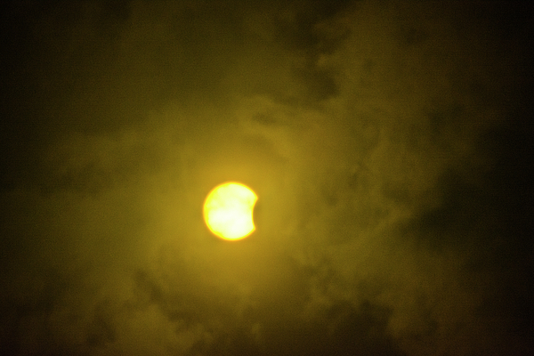 Brigitta Diaz - Start of the Solar Eclipse with clouds