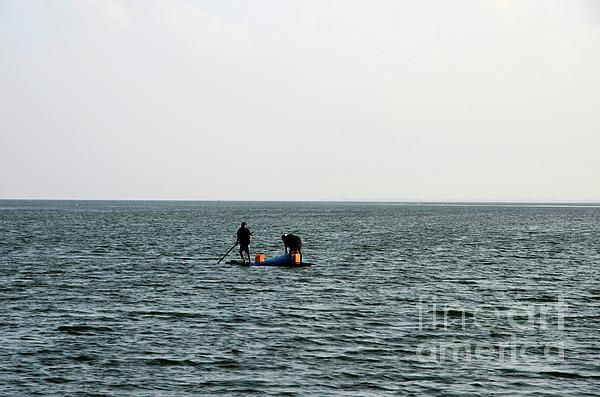 Man sits by Black sea shore with fishing pole Batumi Georgia Photograph by  Imran Ahmed - Pixels