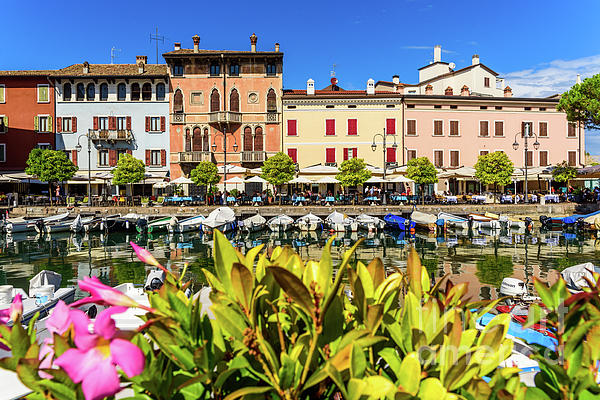 Joaquin Corbalan - View of the small old port of Lake Garda a sunny day in Desenzano.