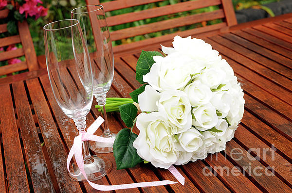 Premium Photo  Champagne glass with flowers backdround