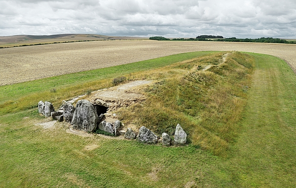 West Kennet long barrow Avebury England. Prehistoric Neolithic chambered burial site. Barrow mound 104m long 25m wide. Looking S.W. aka West Kennett