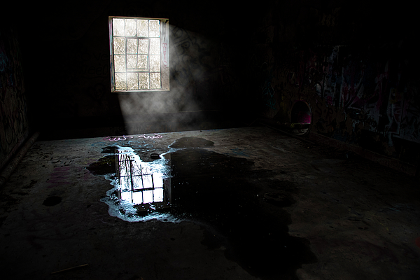 John Twynam - Window Reflected in a Puddle in Abandoned Building