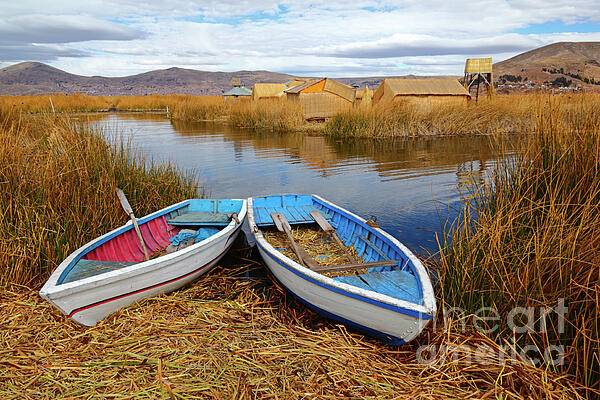 James Brunker - Wooden rowboats on the Uros Islands Lake Titicaca Peru