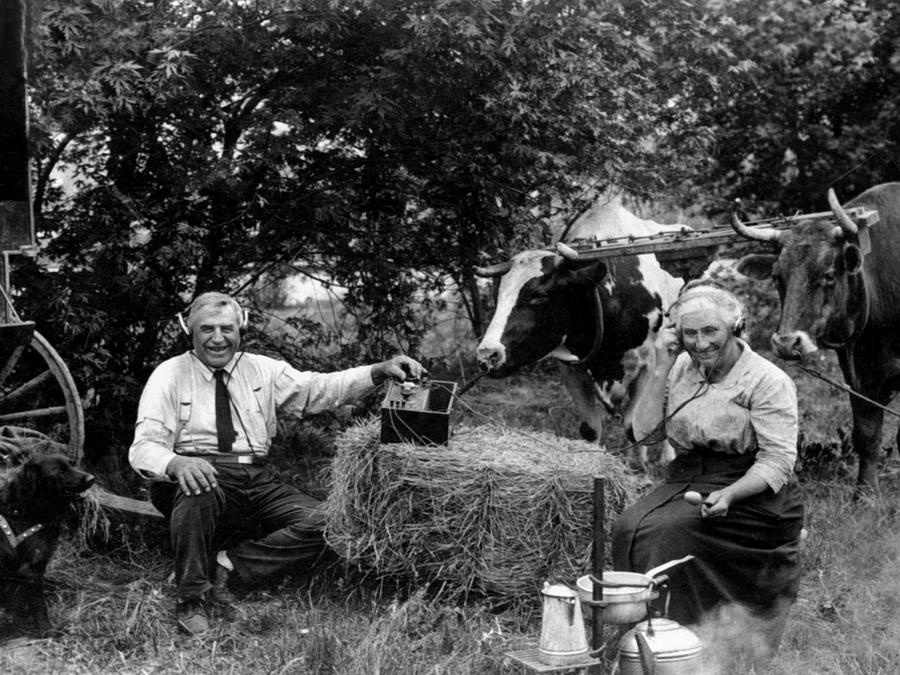 https://images.fineartamerica.com/images/artworkimages/mediumlarge/1/-couple-listening-radio-campsite-circa-1925-black-mark-goebel.jpg