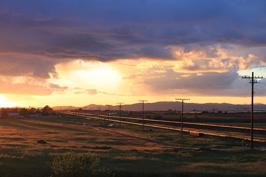  Last Light on the Railroad Photograph by Remegio Onia