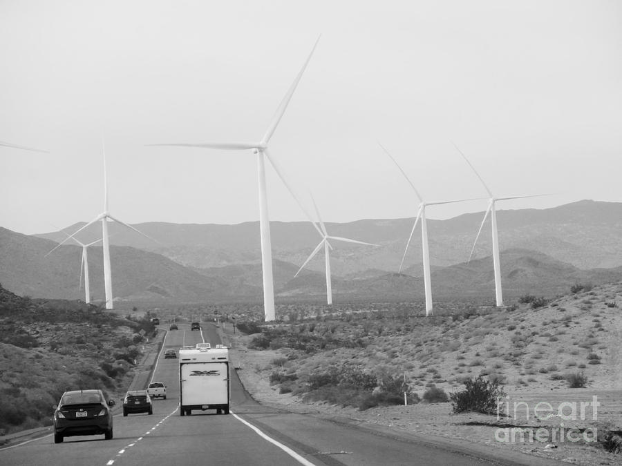  Mountains- Wind Turbine and Road with Cars Photograph by Claudia Ellis