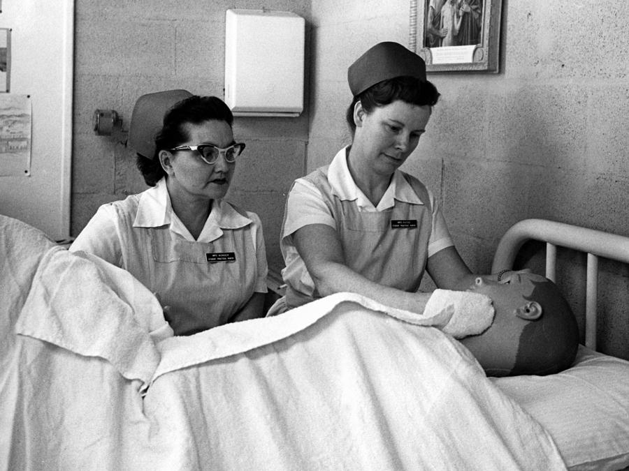 Nurse In Training Bathing Dummy Patient Circa Photograph by Mark Goebel ...