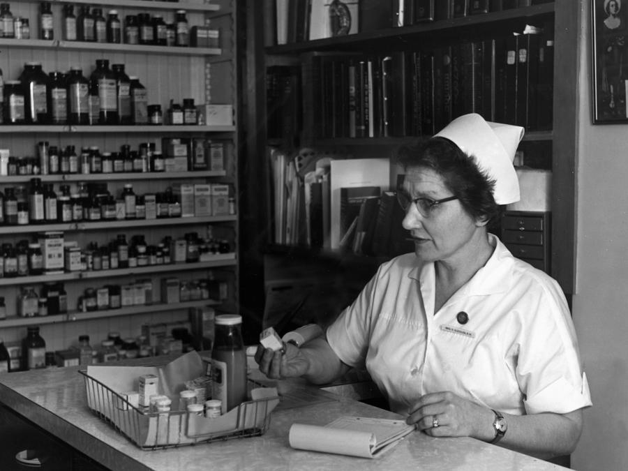 Nurse Working In Pharmacy Circa 1960 Black White Photograph by Mark ...