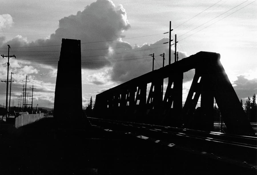  Silhouetted Rail Bridge Photograph by Tara Lynn