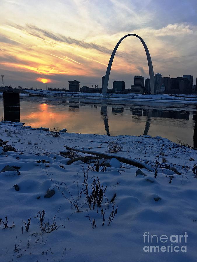  St. Louis sunset on a snowy Mississippi Riverfront  Photograph by Debbie Fenelon