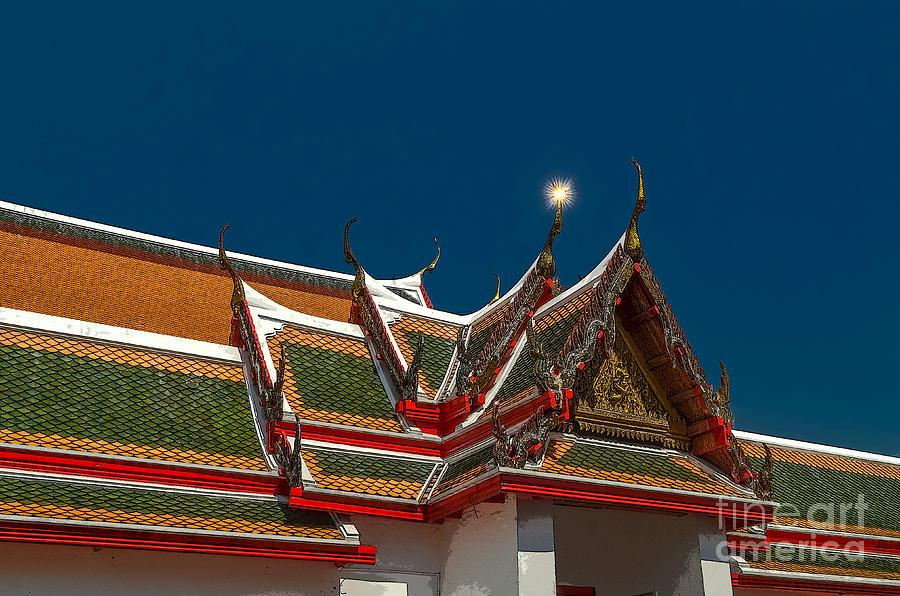 Architecture Photograph - sun reflection on the roof of Wat Arun by Michelle Meenawong