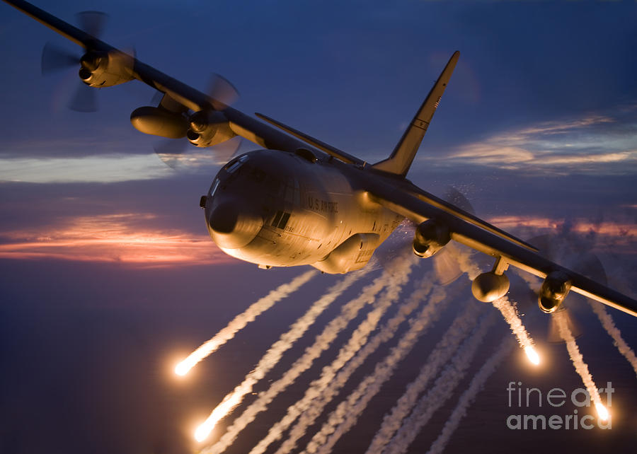 Transportation Photograph - A C-130 Hercules Releases Flares by HIGH-G Productions