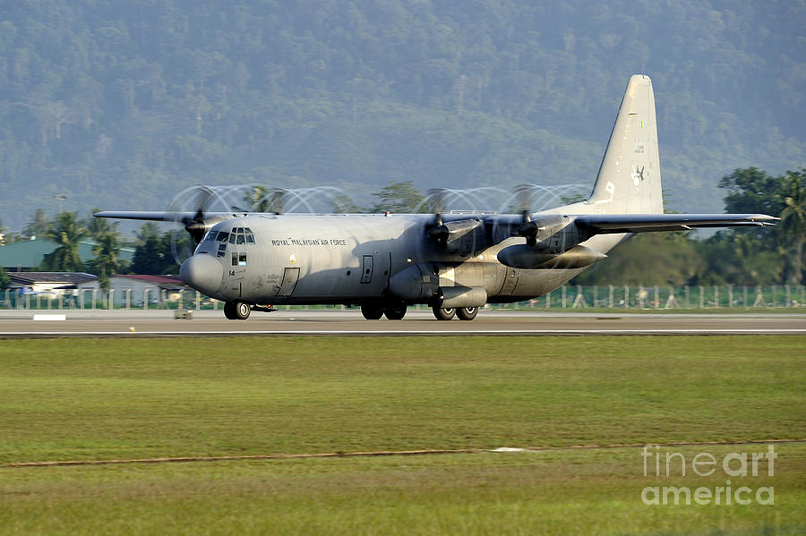 Transportation Photograph - A C-130j Hercules Of The Royal #1 by Remo Guidi