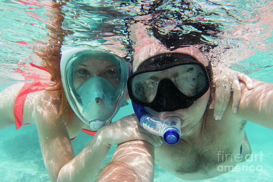 A couple in love taking selfie underwater in Indian Ocean, Maldives #2 Photograph by Michal Bednarek