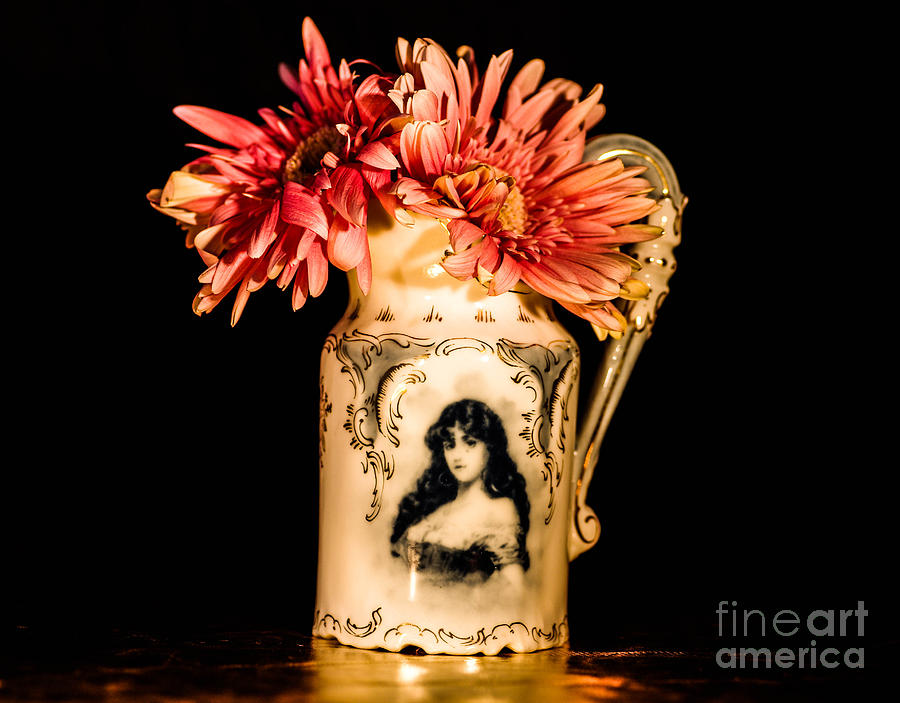 A unique vase with pink flowers  #1 Photograph by Gerald Kloss