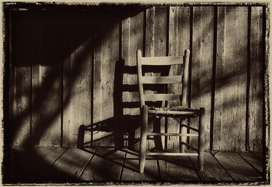 Abandoned hand made chair on a Ozark timber cutters porch1969 #1 Photograph by Garry McMichael