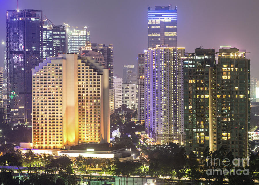 Aerial night view of Jakarta urban skyline in Indonesia #1 Photograph by Didier Marti