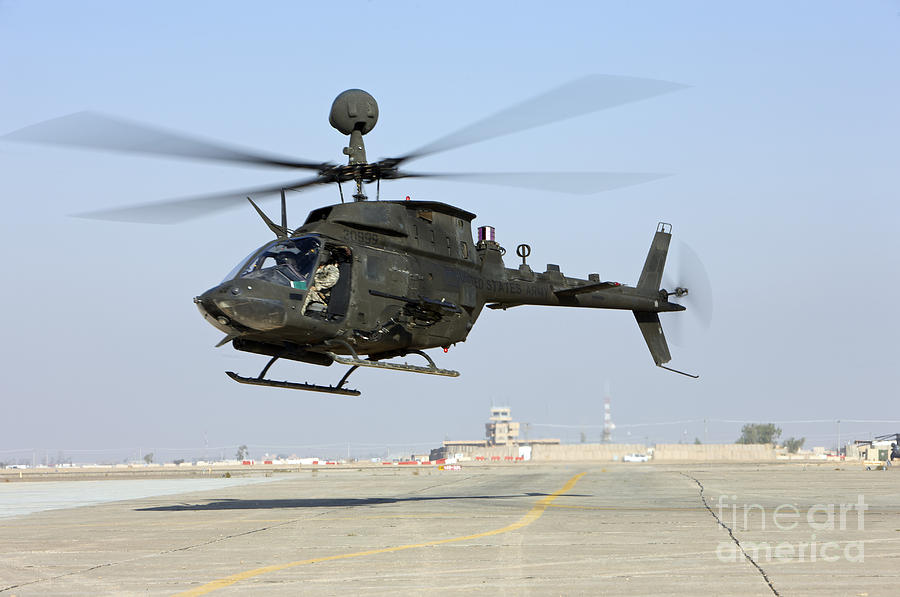 An Oh-58d Kiowa Warrior Hovers #1 Photograph by Terry Moore