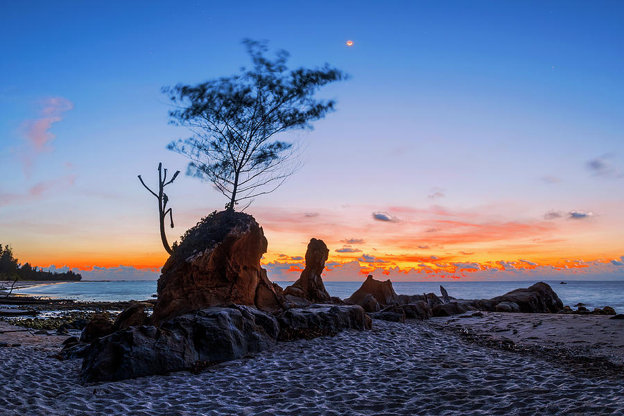 Beautiful rocky Tindakon beach sunset view in Kudat Malaysia #1 Photograph by Pradeep Raja PRINTS