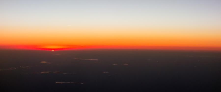 Beautiful Sunset View From An Airplane Over Land #1 Photograph by Alex Grichenko