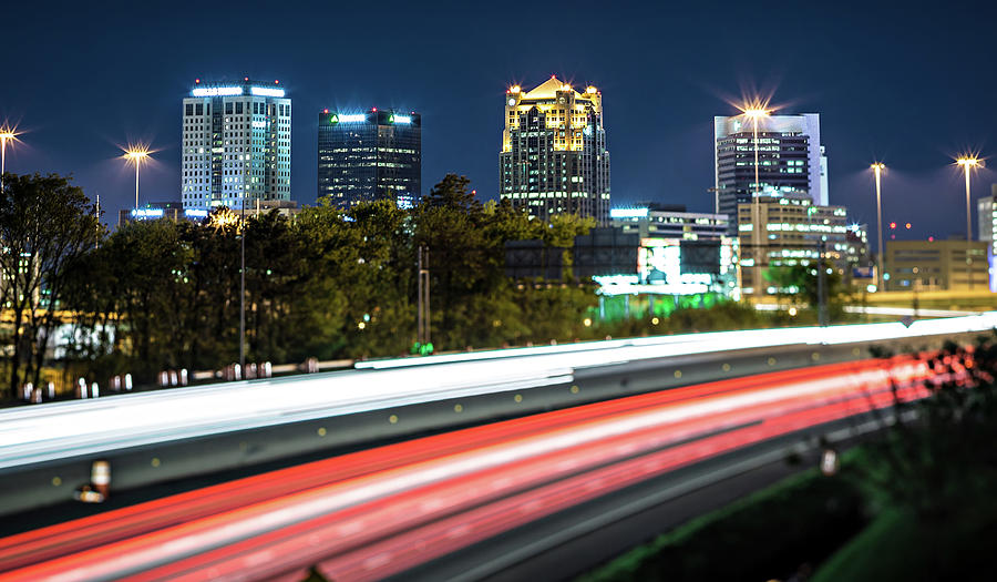 Birmingham Alabama City Skyline And Highway Traffic Trails #1 Photograph by Alex Grichenko