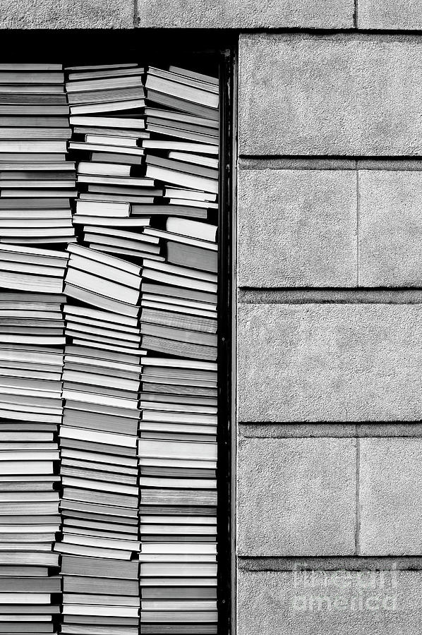 Books Stacked Against Window #1 Photograph by Jim Corwin