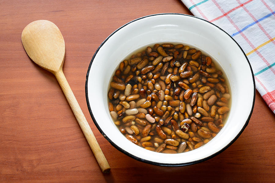 Brown Beans in Water Photograph by Alain De Maximy Fine Art America