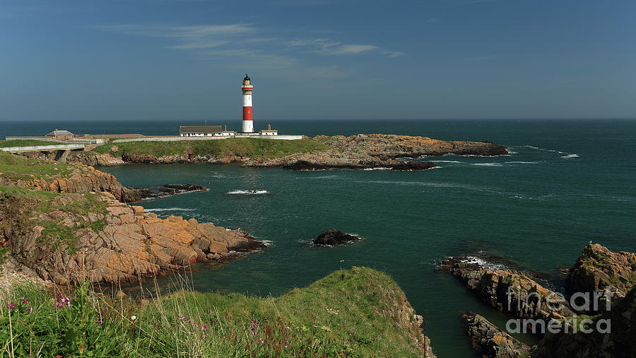 Buchan Ness Lighthouse and the North Sea #1 Photograph by Maria Gaellman