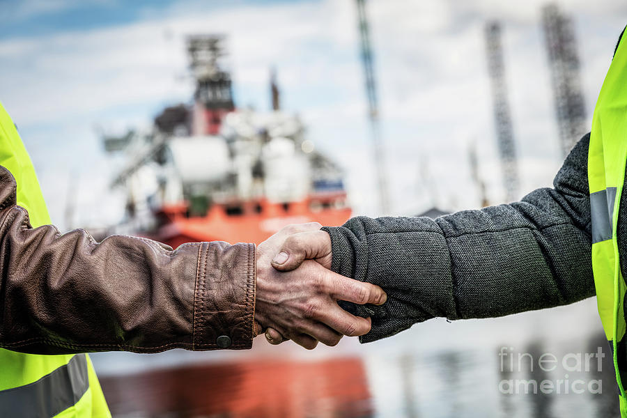 Business handshake in a shipyard. Shipbuilding industry #1 Photograph by Michal Bednarek