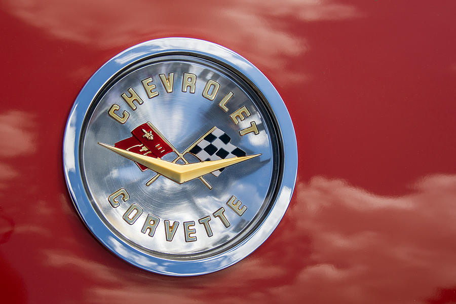 Corvette Emblem  with Clouds Photograph by Phil Cardamone