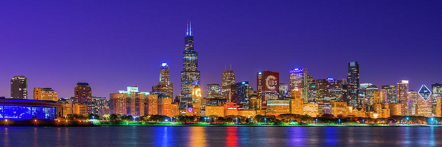 Chicago skyline with Cubs World Series lights night, Lake Michigan, Chicago, Cook County, Illinois #1 Photograph by Panoramic Images
