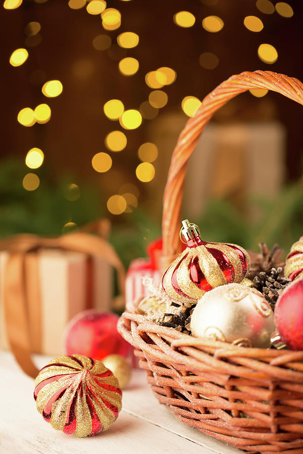 Christmas Basket With Red And Golden Ornaments Photograph