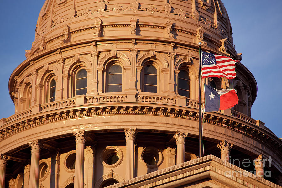Architecture Photograph - Close-up of the State Capitol Dome in Austin, Texas with the USA and Texas Lone Star Flags waving in the wind #1 by Dan Herron