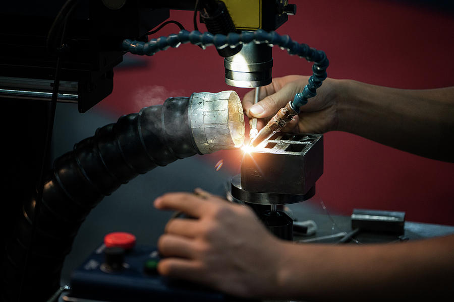 Closeup of laser welding process #1 Photograph by Anek Suwannaphoom