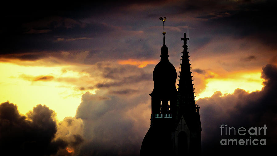 Cloudscape of orange sunset old town Riga Latvia #1 Photograph by Raimond Klavins