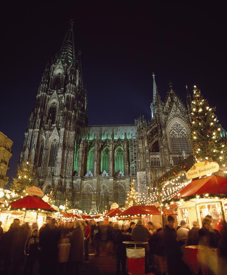 Christmas Photograph - Cologne Cathedral And Christmas Market #1 by Axiom Photographic