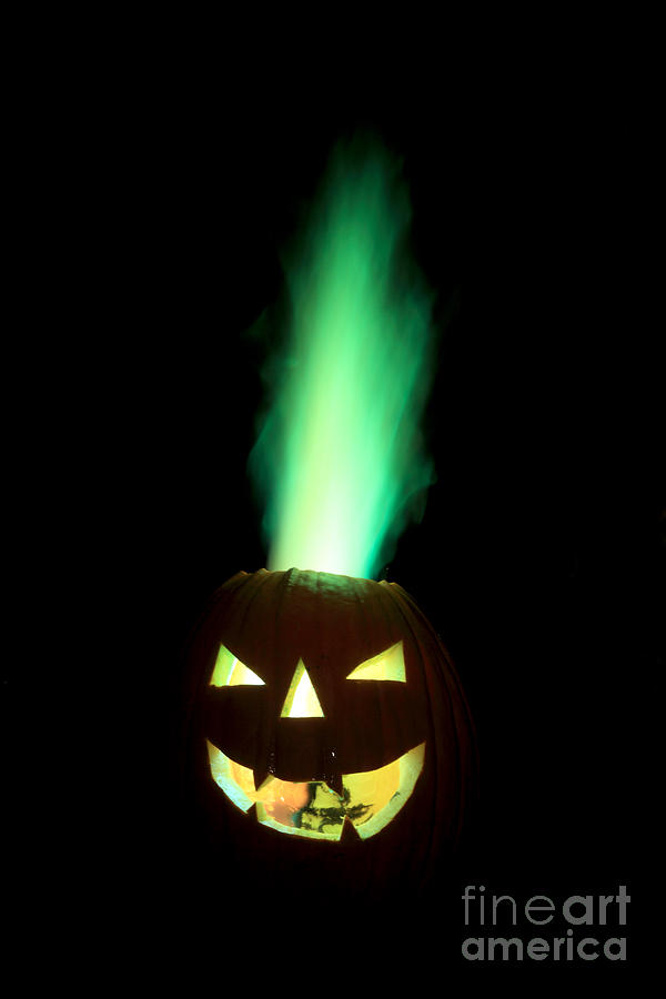 Colored Flame In Burning Pumpkin #1 Photograph by Ted Kinsman