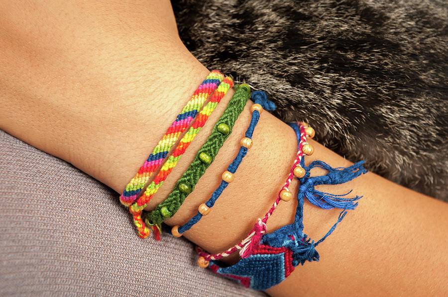 Colorful friendship bracelet on a child's hand Photograph by Stefan ...