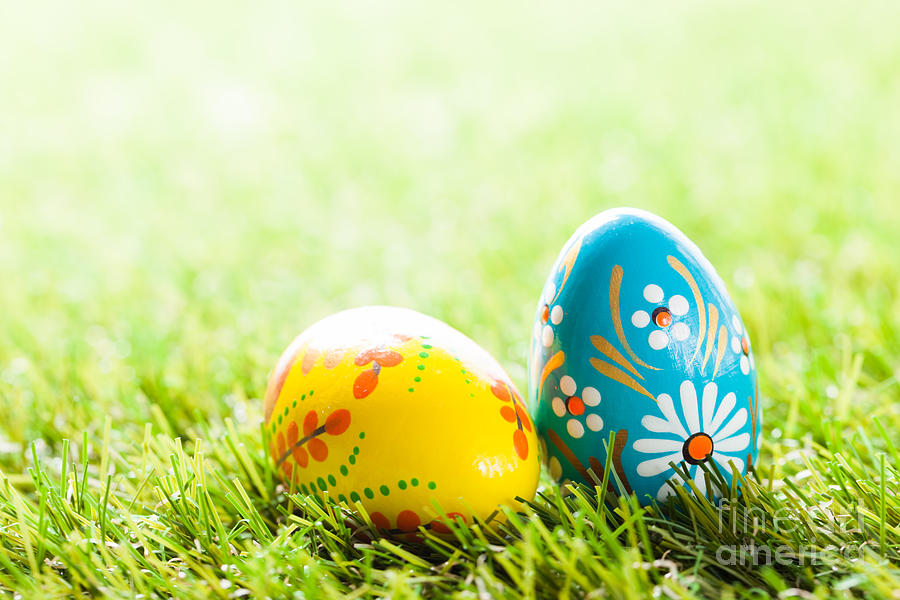 Easter Photograph - Colorful hand painted Easter eggs in grass #1 by Michal Bednarek