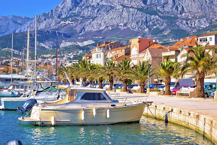 Colorful Makarska boats and waterfront under Biokovo mountain vi #1 Photograph by Brch Photography