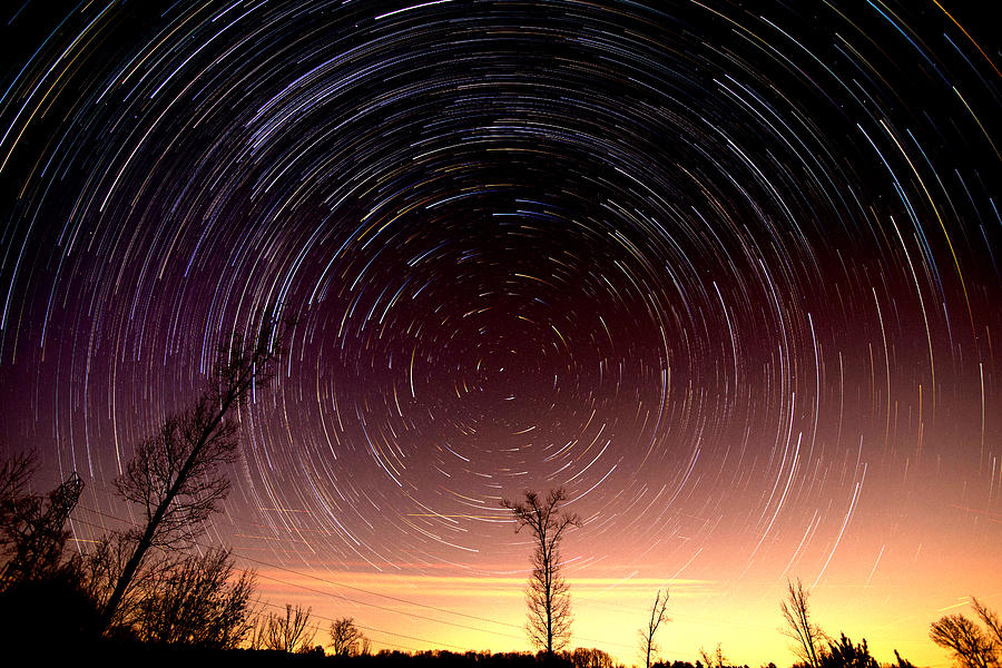 Cumulative time lapse of star trails in night sky #1 Photograph by Alex Grichenko
