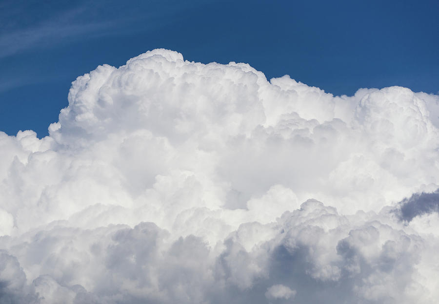 Cumulus Clouds And Blue Sky Photograph by Dave Pattinson