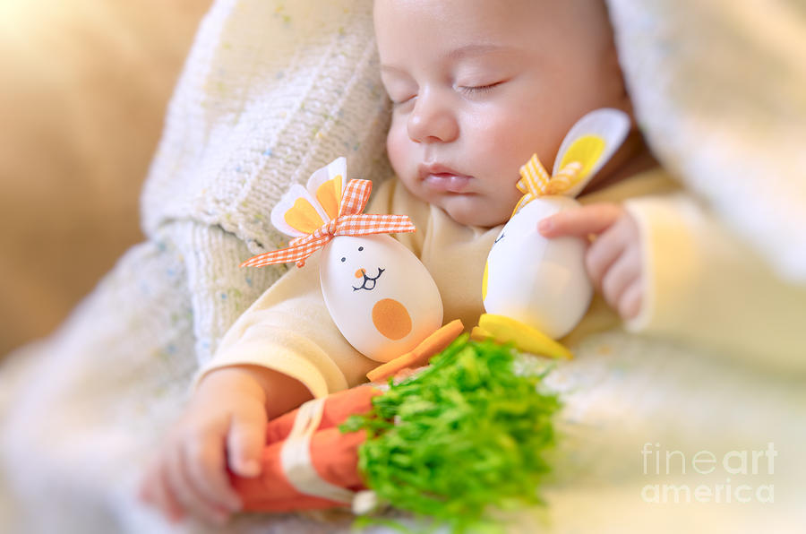 Cute baby sleeping with Easter decorations #1 Photograph by Anna Om
