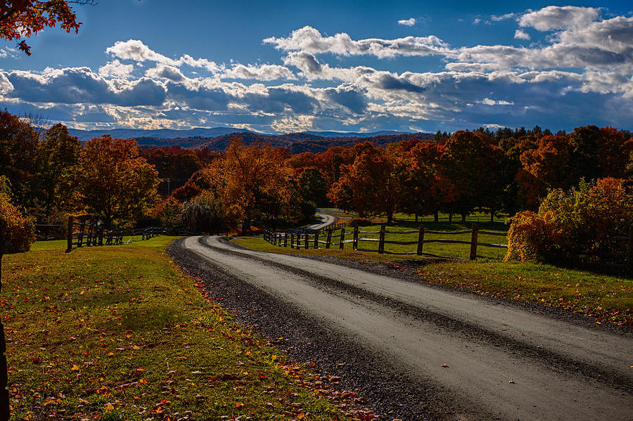 Dirt road through Vermont fall foliage #1 Photograph by Jeff Folger