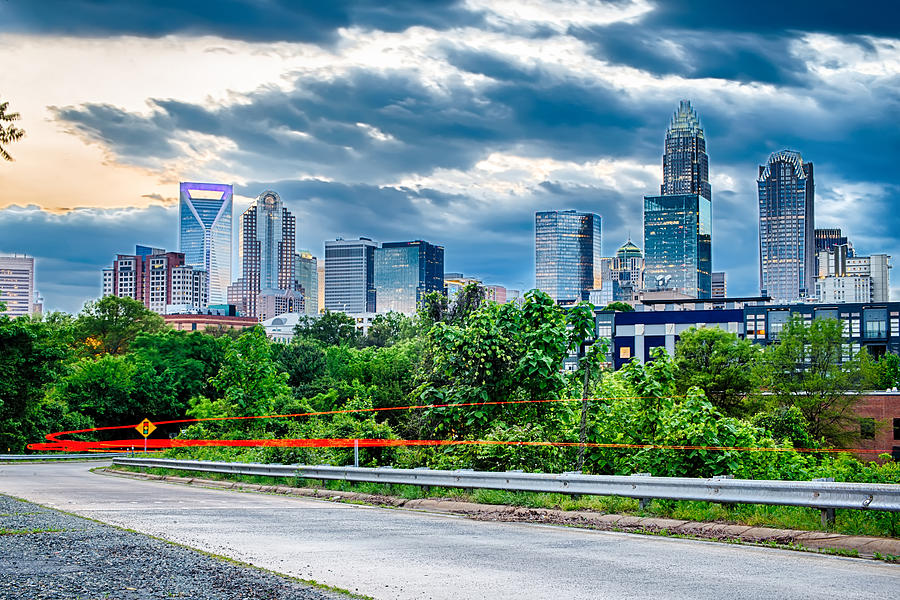 Charlotte Photograph - Downtown of Charlotte  North Carolina skyline with dramatic sky #1 by Alex Grichenko
