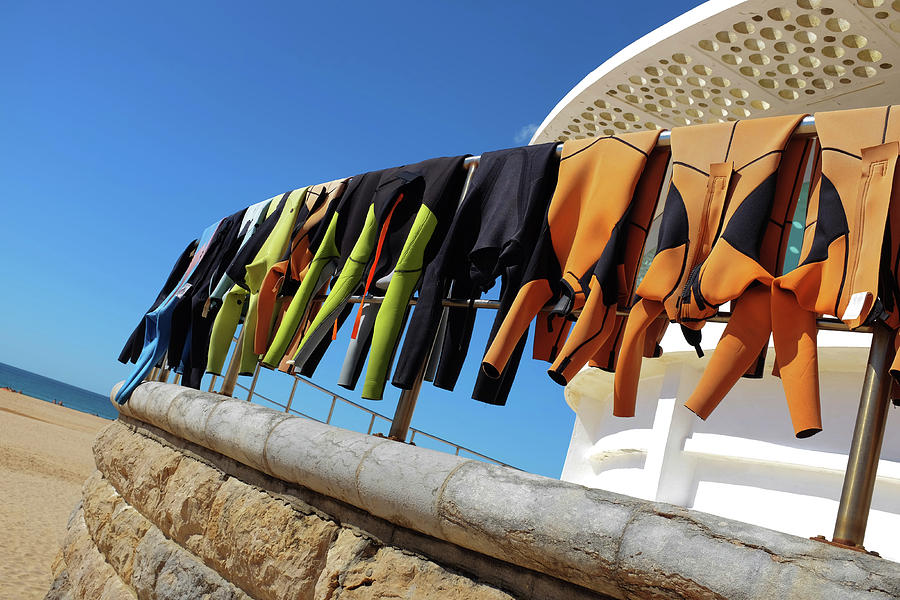 Summer Photograph - Drying Wet Suits #1 by Carlos Caetano