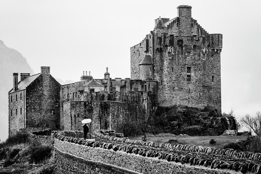 Black And White Photograph - Eilean Donan Visitor #1 by Guy Shultz