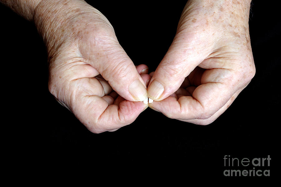 Elderly Hands Break A Pill #1 Photograph by Scimat