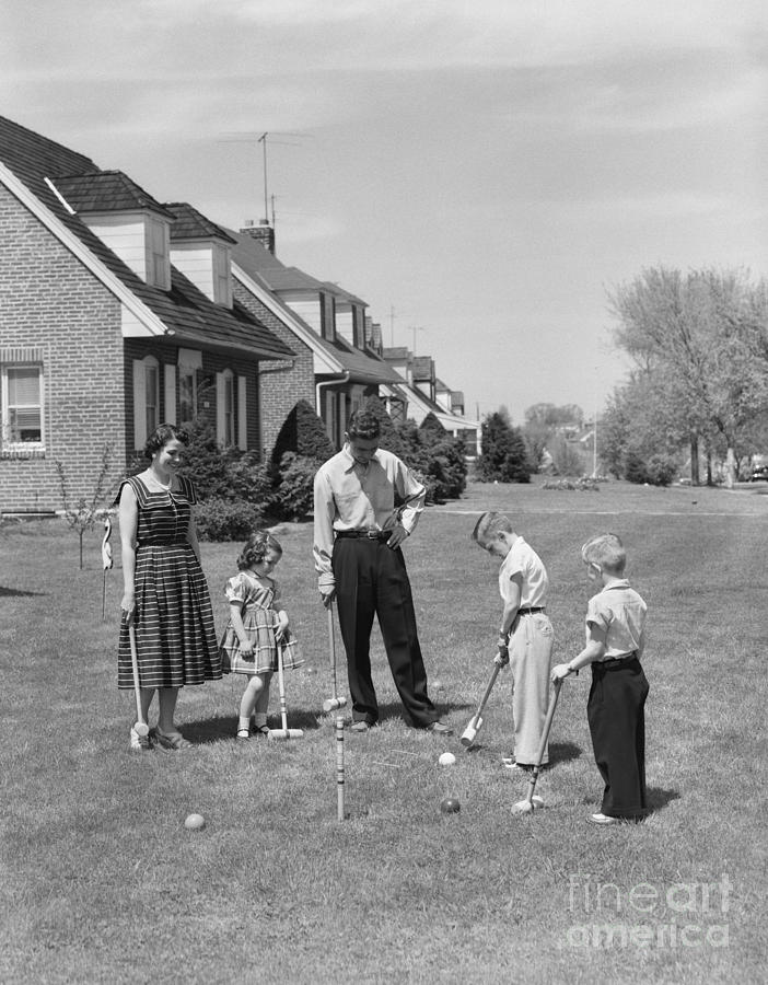 Family Playing Croquet, C.1950s #1 Photograph by H. Armstrong Roberts/ClassicStock