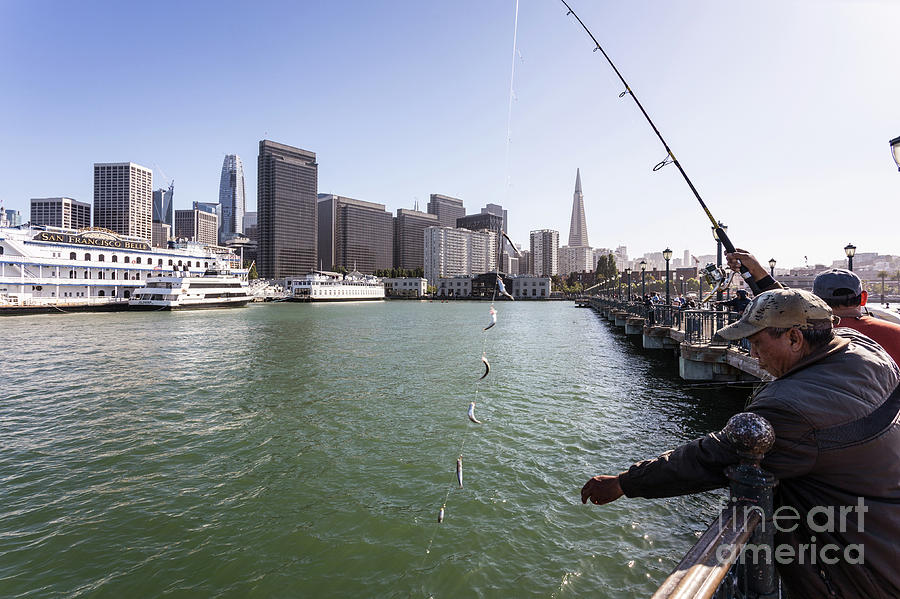 Fisherman in San Francisco Embarcadero on a sunny day #1 Photograph by Didier Marti